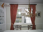 Red Drapes In White Room